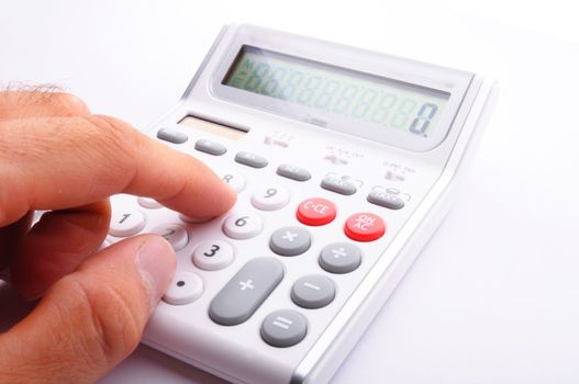 accounting concept with calculator and pen in business office
