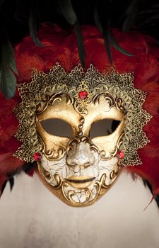 Gold traditional venetian carnival mask. Venice, Italy.