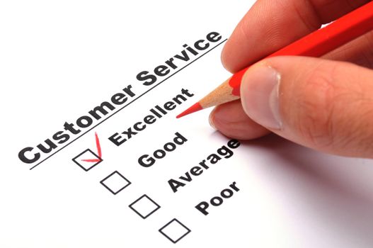 excellent or good marketing customer service survey with red pencil and checkbox