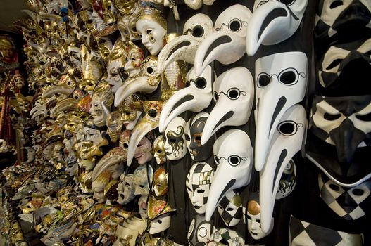 Big amount of traditional venetian carnival masks. Venice, Italy.