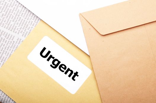 urgent delivery concept with envelope letter or mail and word