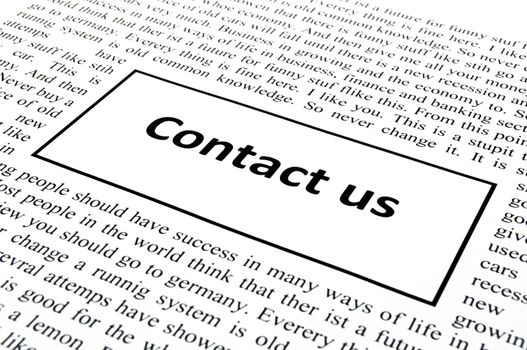 contact us concept with newspaper showing business communication