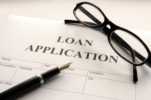loan application form or document in bank office showing finance concept