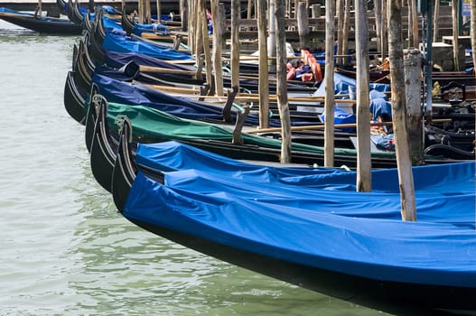 Many parked famous gondolas in Venice, Italy