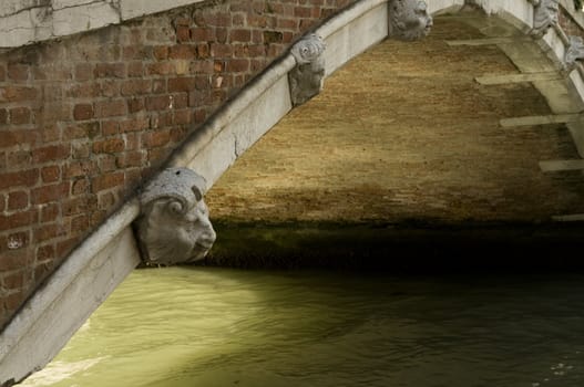 Closeup on sculpture on bridge in Venice, Italy