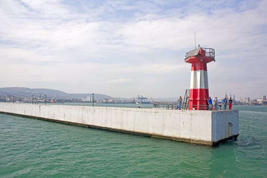 At entrance to port of Lighthouse on shores of Black Sea, Novorossiysk, Russia.