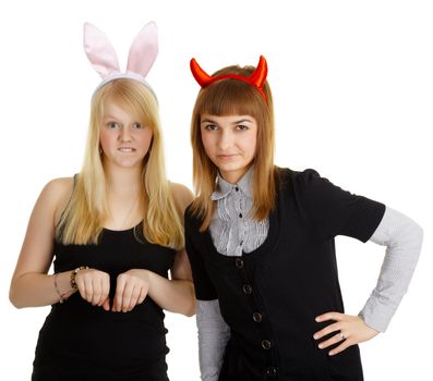 Two girls - girlfriends in fancy dresses on a white background