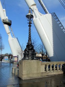 Base of London eye including city light