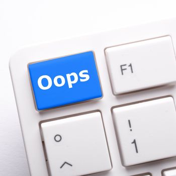 oops key on computer keyboard showing mistake concept