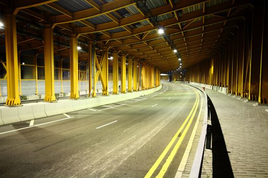 highway tunnel at night and no car