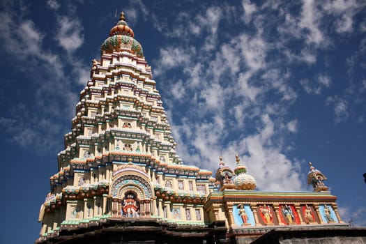 The beautiful architecture of the dome of an ancient temple in India.