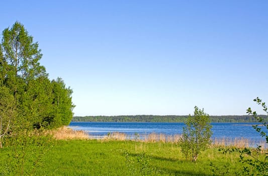 View on  shore of Lake Valdai against  blue sky, Russia.