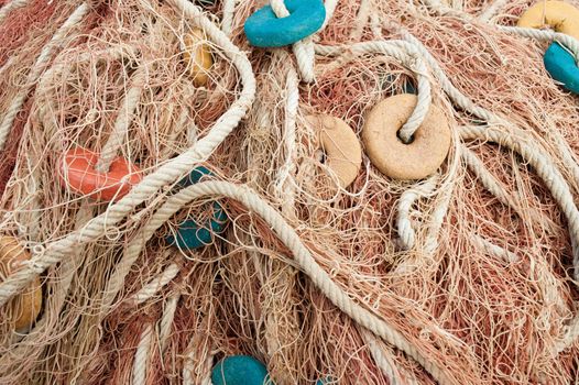 Detail  of a colorful stack of trawl fishing nets