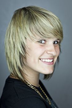 An image of a beautiful smiling teen girl