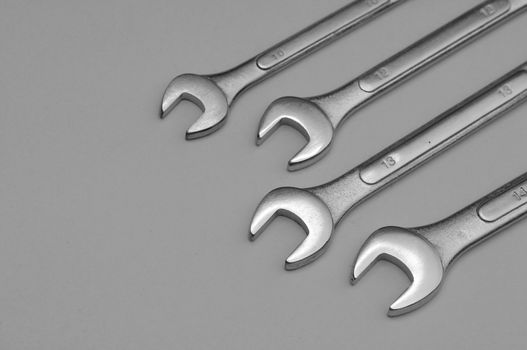 A set of spanners isolated on a  light background