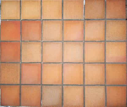 Floor in terracotta square tiles