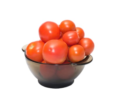 Red tomatoes on a dish it is isolated on a white background.