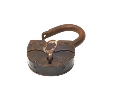 Old rusty padlock and key on white background.