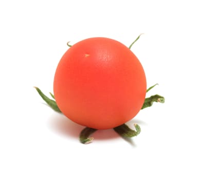 Red tomato close up it is isolated on a white background.