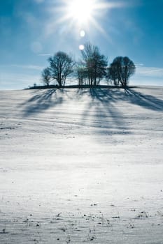 Snowy Hill with Sun, taken in Upper Austria