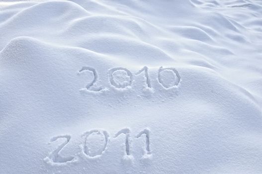 Year 2010 and 2011 written in Snow