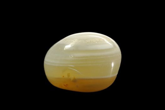 Mineral agate isolated on black background.