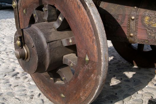 Old wooden wheel on an old wagon