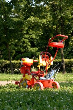 Children's carriage in a small city garden