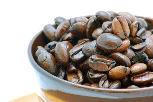 brown coffee beans isolated on the white background