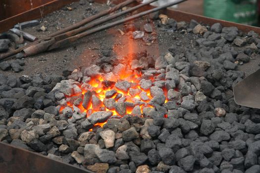 Coal and fire of a blacksmith's smithy