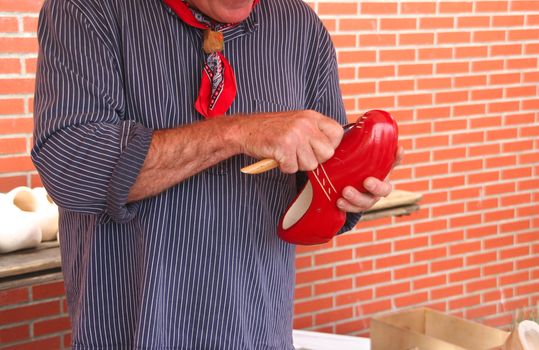 Traditional skill of making Dutch wooden shoes