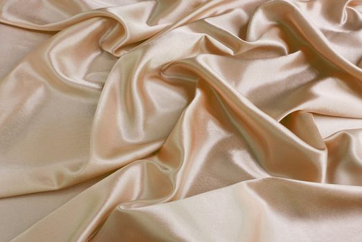 Beige satin with a folds