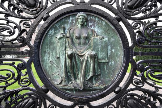 Bronze image of Justitia on the gate of the International Court of Justice in The Hague