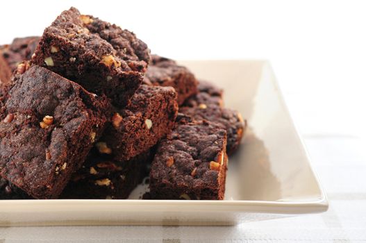 Homemade chocolate brownies served on a plate