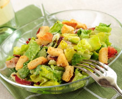 Caesar salad served in a glass bowl