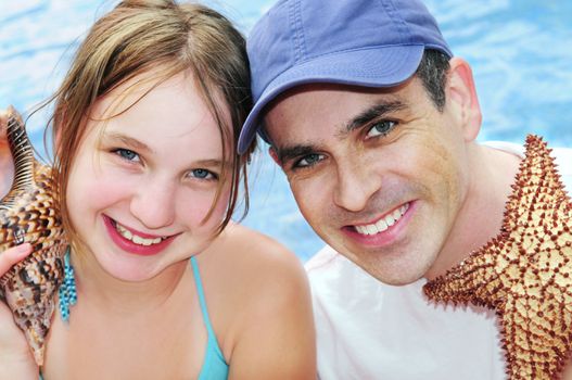 Portrait of a family enjoying tropical vacation