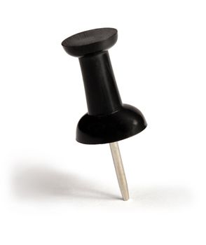 Macro image of a single black push-pin.
