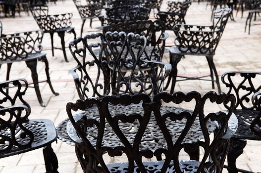 Wrought iron furniture on the outdoor cafe patio