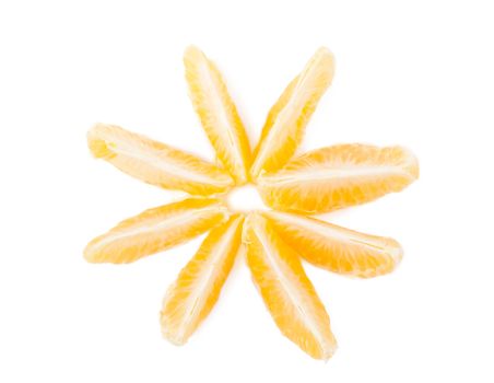 Closeup view of tangerine sections isolated on the white