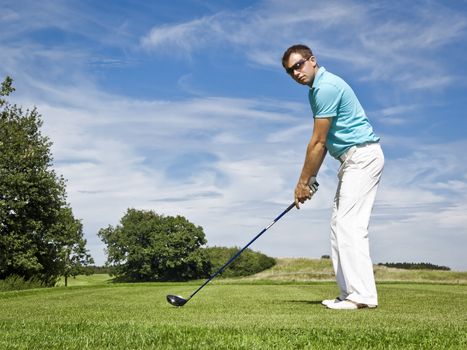 An image of a young male golf player