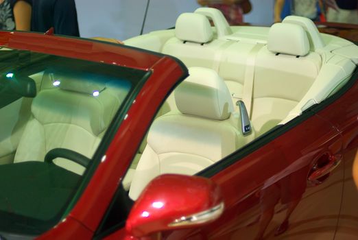 Red sports car in the car exhibition