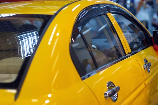 Yellow car on display at the exhibition