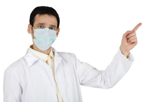 The young man in a medical mask points a finger