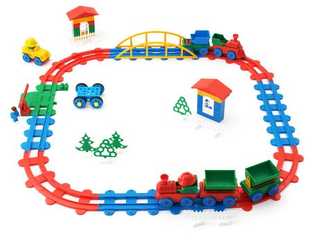 The children's railway, trains and other toys on a white background