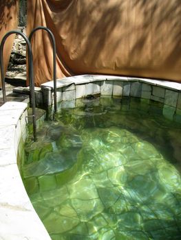 Baptismal font; pilgrimage; holy water; saint place; religion