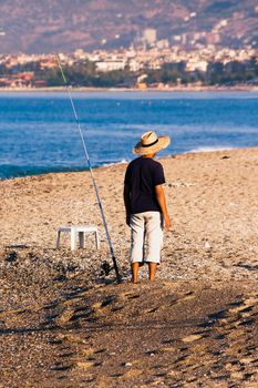 The Mediterranean coast of Turkey, the fisherman behind work