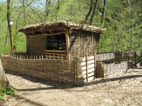 Shelter for cattle; a wattled fence; a fence; a protection; a museum