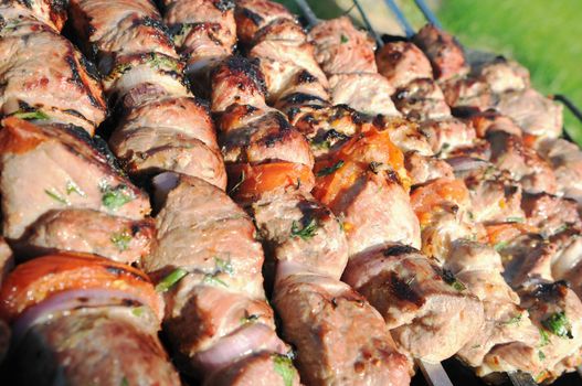 Kebabs, threaded on a skewer and grill.