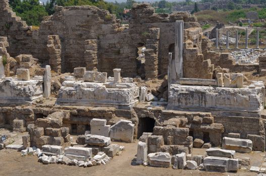 The ruins of the ancient amphitheater. Turkey, Side. Amid the ruins - ancient columns.