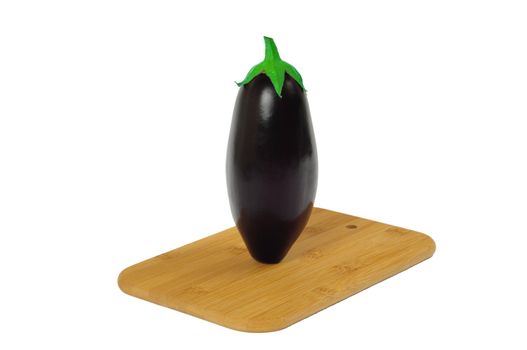 Eggplant on wooden board isolated on white